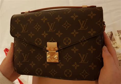 como saber si es original bolsa louis vuitton|bolsas Louis Vuitton usadas.